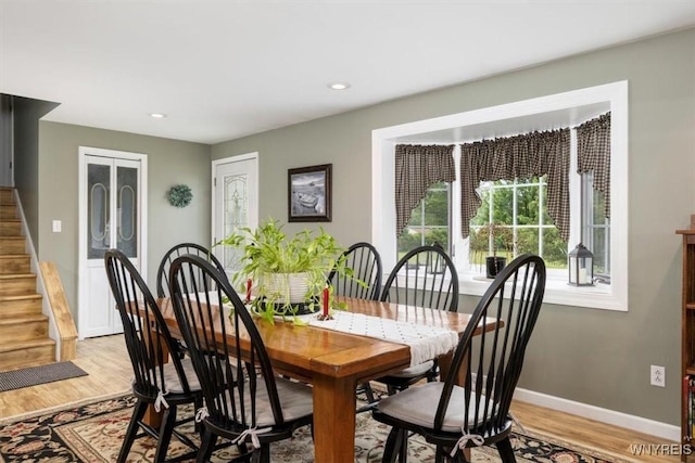 68 Dover Dr, West Seneca, NY 14224 - dining space with light wood-type flooring, stairs, and recessed lighting