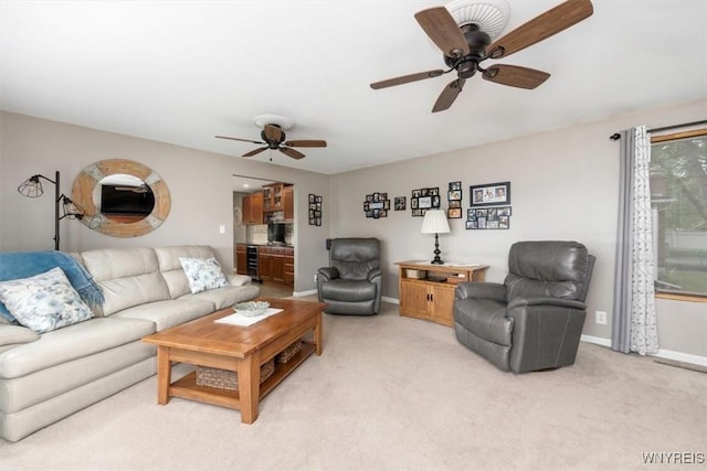 68 Dover Dr, West Seneca, NY 14224 - living room featuring ceiling fan and light carpet