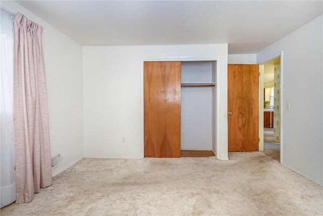 2622 Nichols St, Ogden, NY 14559 - unfurnished bedroom featuring carpet and a closet