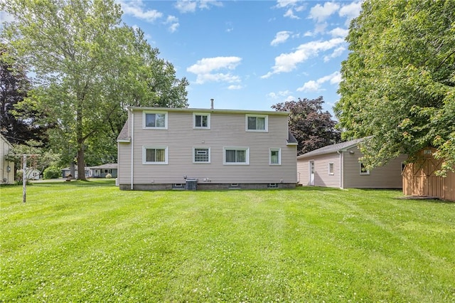 2622 Nichols St, Ogden, NY 14559 - back of property with a yard and a storage unit