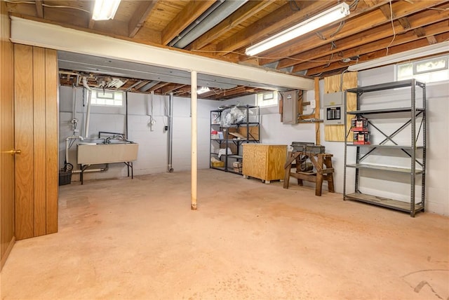 2622 Nichols St, Ogden, NY 14559 - basement featuring a sink and electric panel