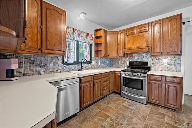 119 Kenneth Ave, Onondaga, NY 13120 - kitchen with stainless steel appliances, premium range hood, brown cabinetry, and light countertops