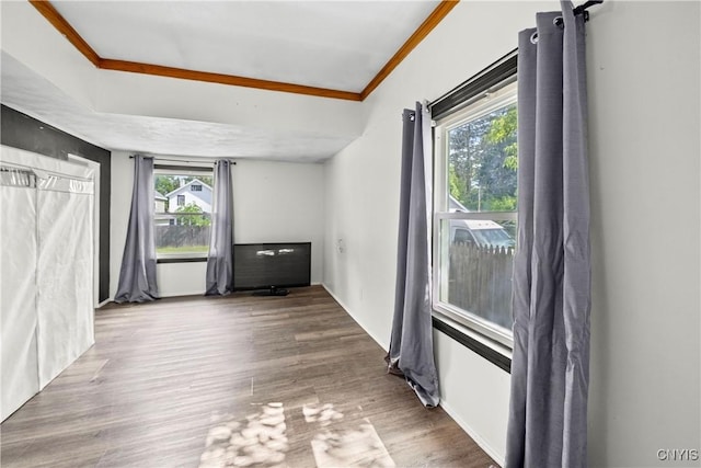 119 Kenneth Ave, Onondaga, NY 13120 - unfurnished living room featuring ornamental molding and wood finished floors