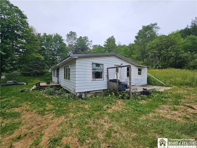 20 N Main St, Bolivar, NY 14715 - view of front of property with a wooden deck