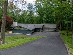 11 Overbrook Rd, Erwin, NY 14870 - view of front facade with asphalt driveway and a carport