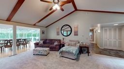 11 Overbrook Rd, Erwin, NY 14870 - carpeted living area featuring a ceiling fan