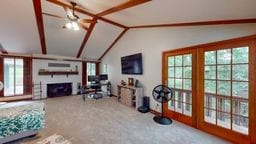 11 Overbrook Rd, Erwin, NY 14870 - carpeted living area with plenty of natural light, a fireplace, and ceiling fan