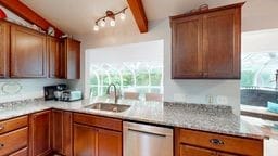 11 Overbrook Rd, Erwin, NY 14870 - kitchen featuring stainless steel dishwasher and brown cabinetry