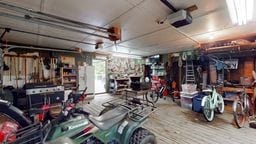11 Overbrook Rd, Erwin, NY 14870 - garage featuring a garage door opener