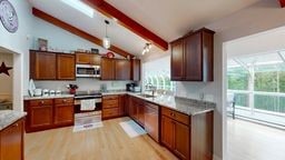 11 Overbrook Rd, Erwin, NY 14870 - kitchen featuring stainless steel appliances, light wood-style floors, and light countertops