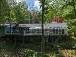 11 Overbrook Rd, Erwin, NY 14870 - back of house with a sunroom and a wooden deck