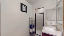 11 Overbrook Rd, Erwin, NY 14870 - bathroom with vanity and vaulted ceiling