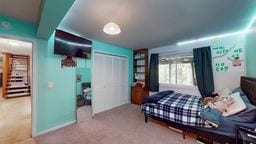 11 Overbrook Rd, Erwin, NY 14870 - carpeted bedroom with baseboards and a closet