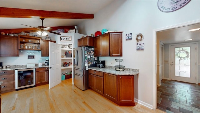 11 Overbrook Rd, Erwin, NY 14870 - kitchen with wine cooler, open shelves, stainless steel fridge, a ceiling fan, and light stone countertops