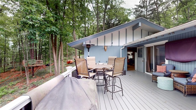11 Overbrook Rd, Erwin, NY 14870 - wooden deck with outdoor dining space and a hot tub