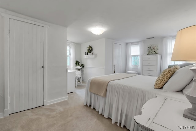 2846 Amsdell Rd, Hamburg, NY 14075 - bedroom featuring light carpet and baseboards