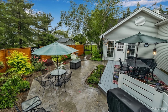 2846 Amsdell Rd, Hamburg, NY 14075 - view of patio featuring outdoor dining area and a wooden deck