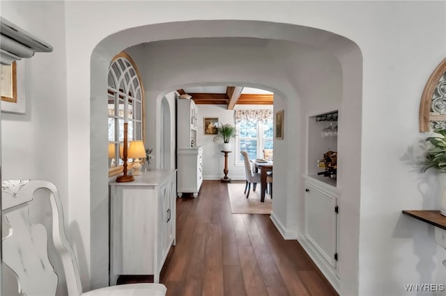 2846 Amsdell Rd, Hamburg, NY 14075 - hall with arched walkways, dark wood finished floors, and beam ceiling
