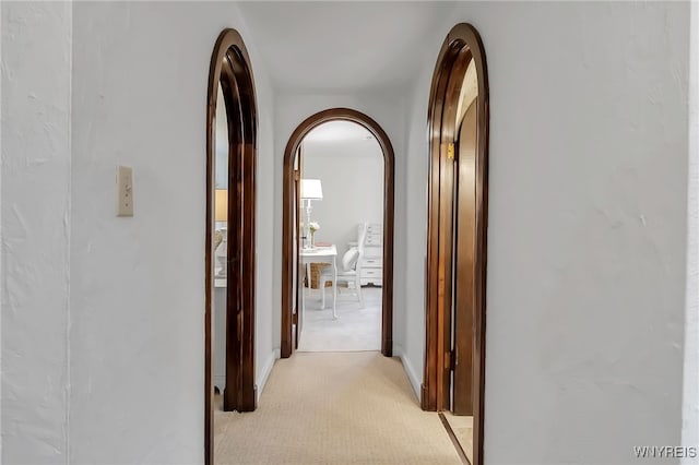 2846 Amsdell Rd, Hamburg, NY 14075 - corridor featuring light carpet and arched walkways