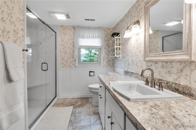 2846 Amsdell Rd, Hamburg, NY 14075 - bathroom featuring wallpapered walls, vanity, a stall shower, and wainscoting