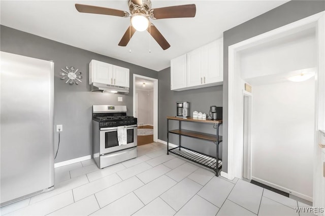 34 Wainwright Rd, Cheektowaga, NY 14215 - kitchen featuring appliances with stainless steel finishes, under cabinet range hood, white cabinetry, a ceiling fan, and light tile patterned floors