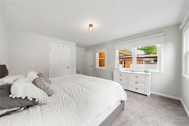 34 Wainwright Rd, Cheektowaga, NY 14215 - bedroom with baseboards and light colored carpet