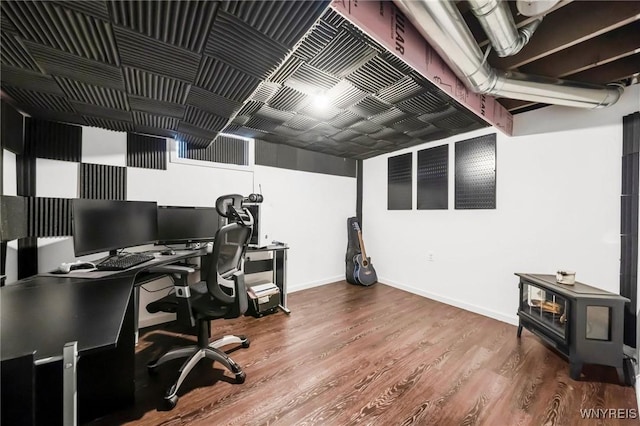 34 Wainwright Rd, Cheektowaga, NY 14215 - office area with a wood stove and wood finished floors