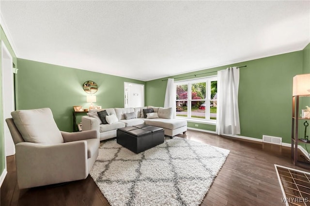 34 Wainwright Rd, Cheektowaga, NY 14215 - living room with wood finished floors and a textured ceiling