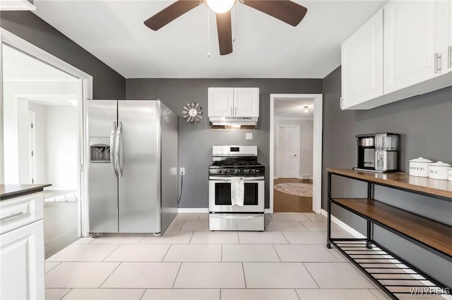 34 Wainwright Rd, Cheektowaga, NY 14215 - kitchen featuring appliances with stainless steel finishes, under cabinet range hood, a ceiling fan, white cabinetry, and light tile patterned floors