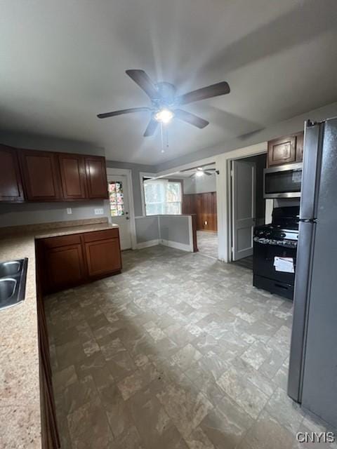 232 Hall Ave, Syracuse, NY 13205 - kitchen featuring appliances with stainless steel finishes, ceiling fan, and light countertops