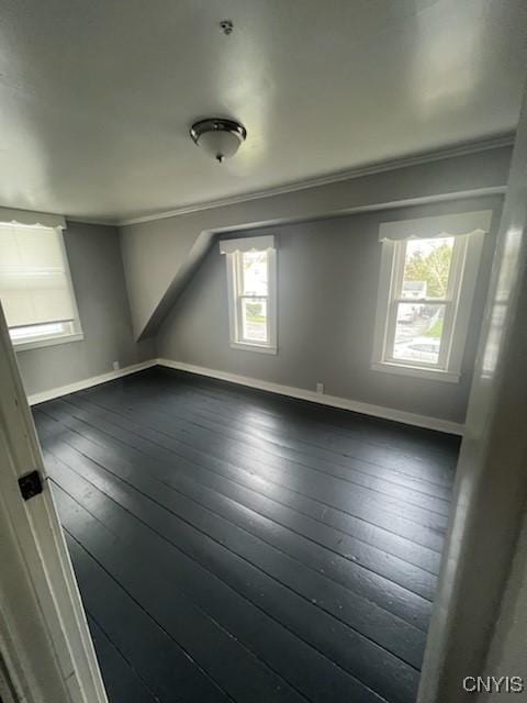232 Hall Ave, Syracuse, NY 13205 - spare room with crown molding and dark wood-type flooring