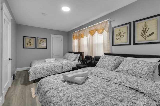 549 15th St, Niagara Falls, NY 14301 - bedroom featuring wood finished floors and a closet