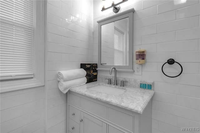 549 15th St, Niagara Falls, NY 14301 - bathroom with vanity and tile walls