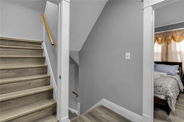 549 15th St, Niagara Falls, NY 14301 - stairway with wood finished floors and baseboards