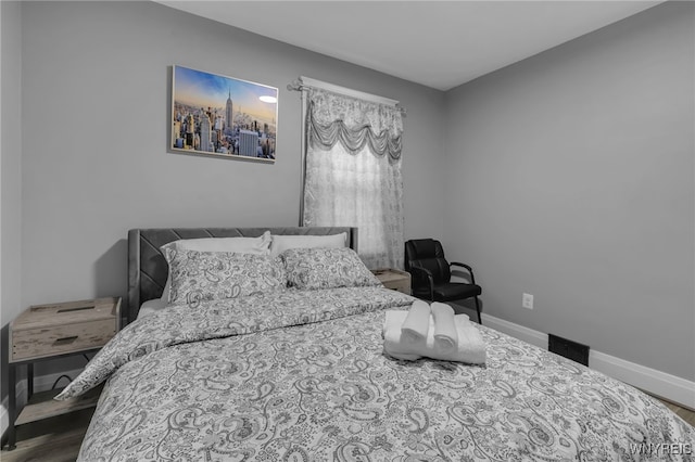 549 15th St, Niagara Falls, NY 14301 - bedroom featuring wood finished floors and baseboards