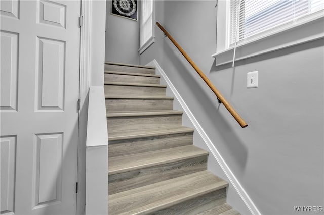 549 15th St, Niagara Falls, NY 14301 - stairs featuring healthy amount of natural light and wood finished floors