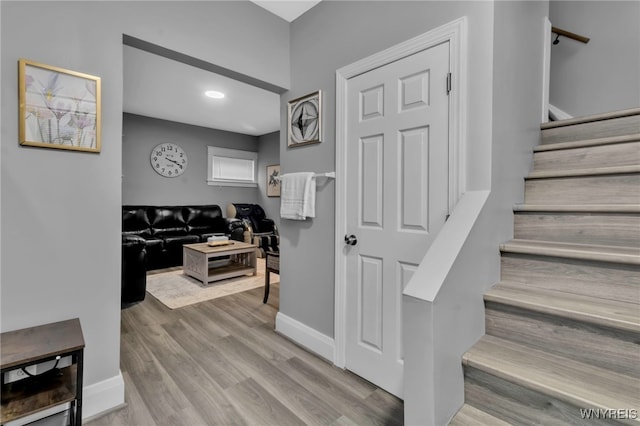 549 15th St, Niagara Falls, NY 14301 - stairs with wood finished floors and baseboards