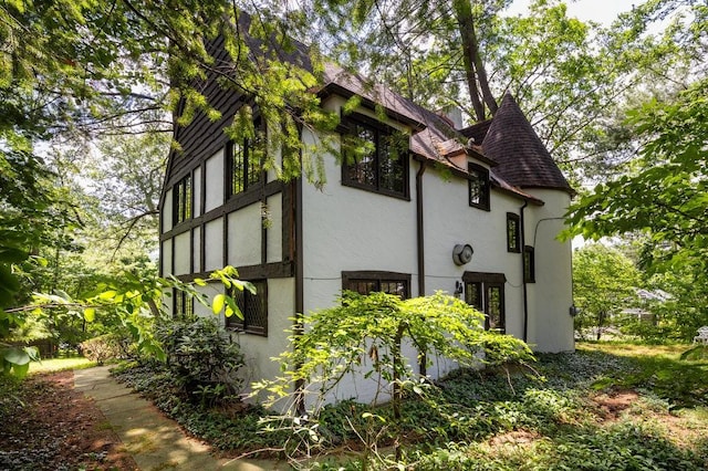 320 Glen Ave, Elmira, NY 14905 - view of property exterior with stucco siding