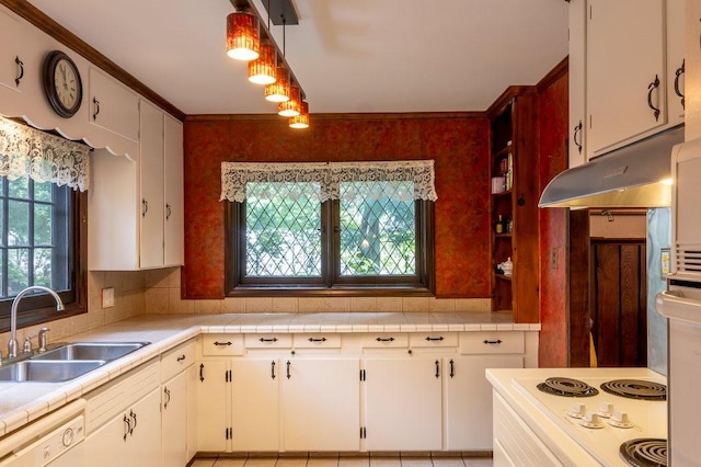 320 Glen Ave, Elmira, NY 14905 - kitchen featuring under cabinet range hood, white appliances, white cabinets, tasteful backsplash, and tile counters