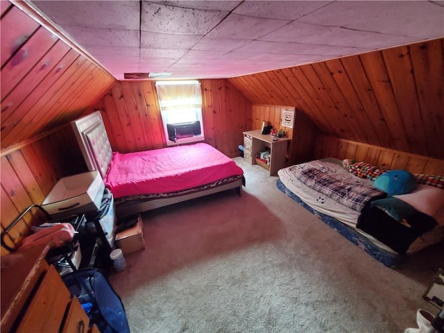 56 Canasta Rd, Greece, NY 14615 - bedroom featuring wood walls, vaulted ceiling, and carpet floors