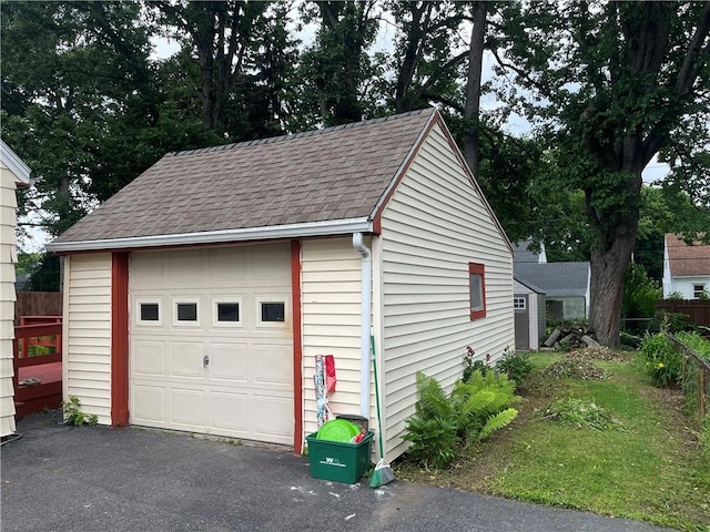 56 Canasta Rd, Greece, NY 14615 - detached garage featuring asphalt driveway