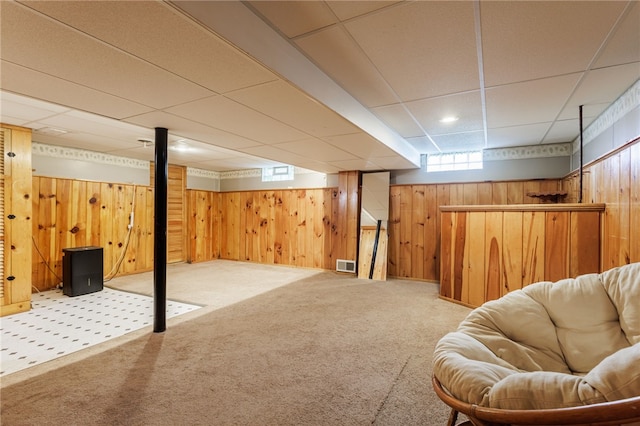 387 Brandon Rd, Irondequoit, NY 14622 - below grade area featuring carpet floors, wooden walls, and a paneled ceiling