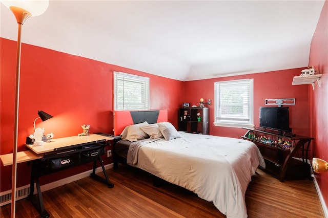 387 Brandon Rd, Irondequoit, NY 14622 - bedroom featuring wood finished floors, vaulted ceiling, and an office area