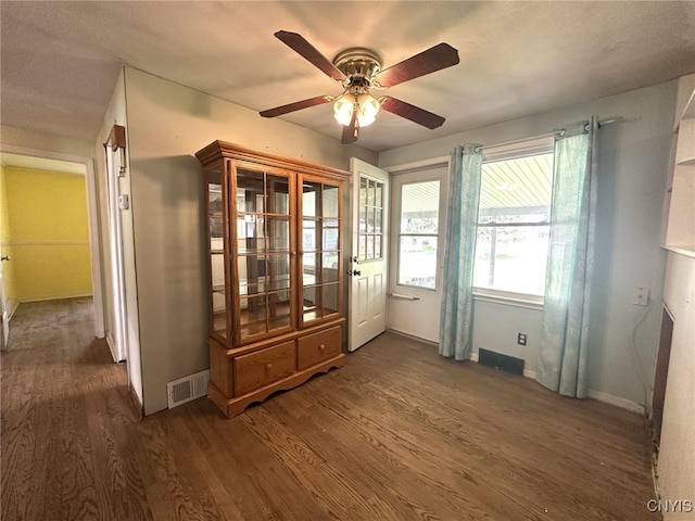 504 Allen Rd, Clay, NY 13212 - interior space featuring a ceiling fan and dark wood finished floors