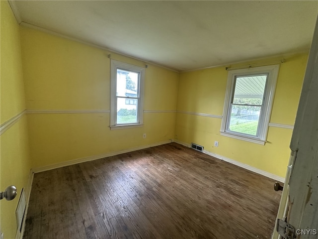 504 Allen Rd, Clay, NY 13212 - empty room with healthy amount of natural light, wood finished floors, and crown molding