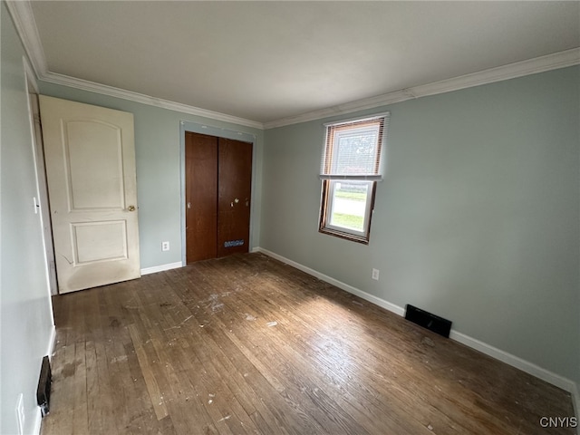 504 Allen Rd, Clay, NY 13212 - unfurnished bedroom featuring wood-type flooring, ornamental molding, and a closet
