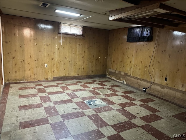 504 Allen Rd, Clay, NY 13212 - basement with light flooring and wood walls