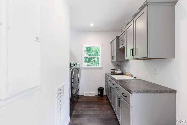 2178 Conley Rd, Sullivan, NY 13037 - laundry room with washing machine and clothes dryer, cabinet space, dark wood-style flooring, and recessed lighting