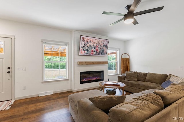 2178 Conley Rd, Sullivan, NY 13037 - living area featuring a ceiling fan, healthy amount of natural light, wood finished floors, and a fireplace