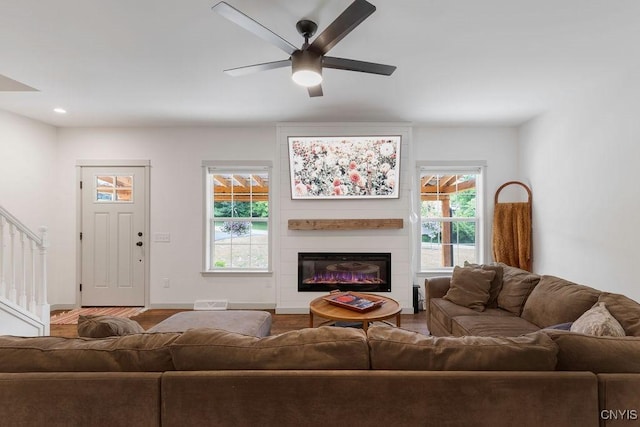2178 Conley Rd, Sullivan, NY 13037 - living area featuring stairway, a ceiling fan, a fireplace, wood finished floors, and recessed lighting